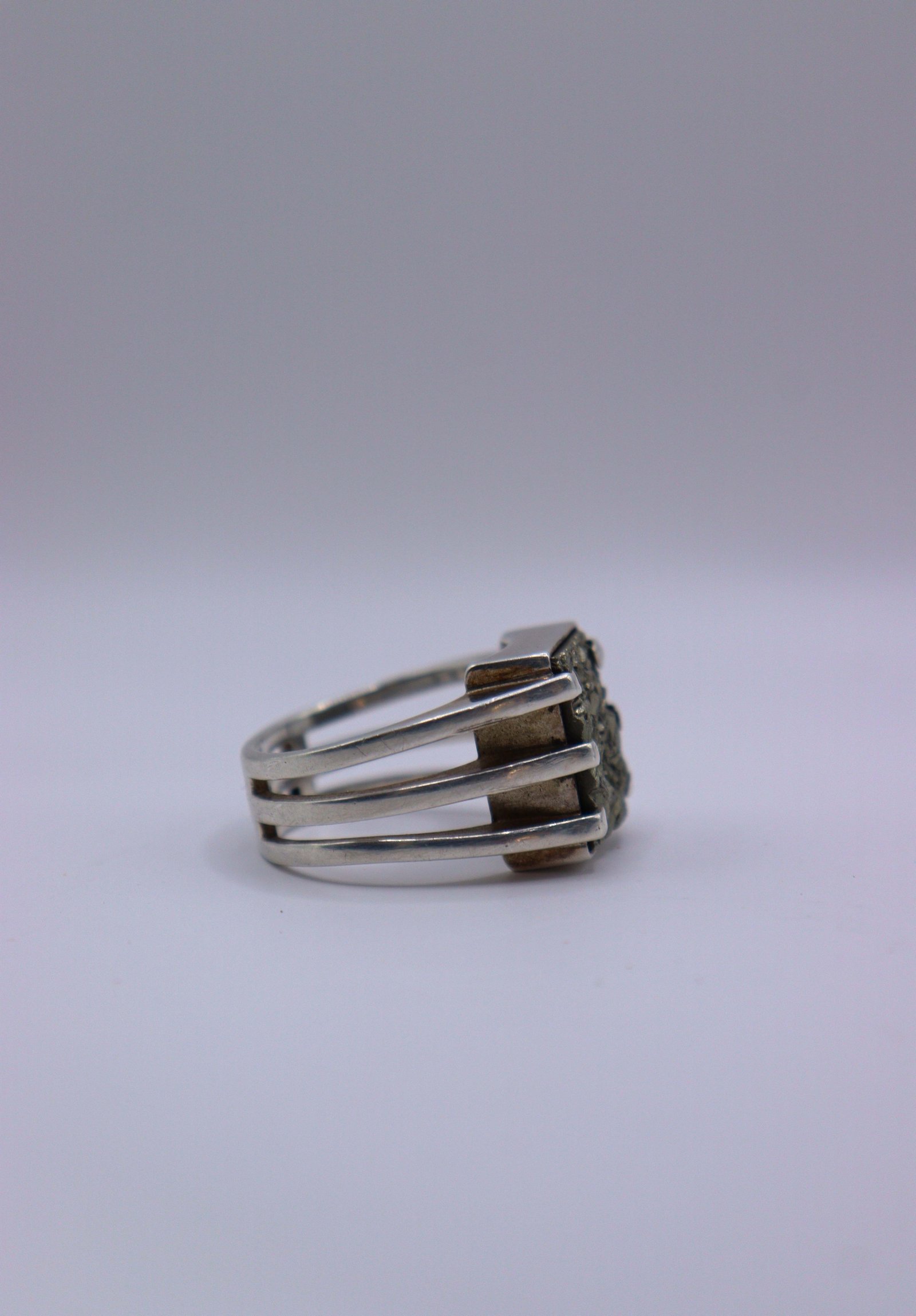 Pyrite ring with silver